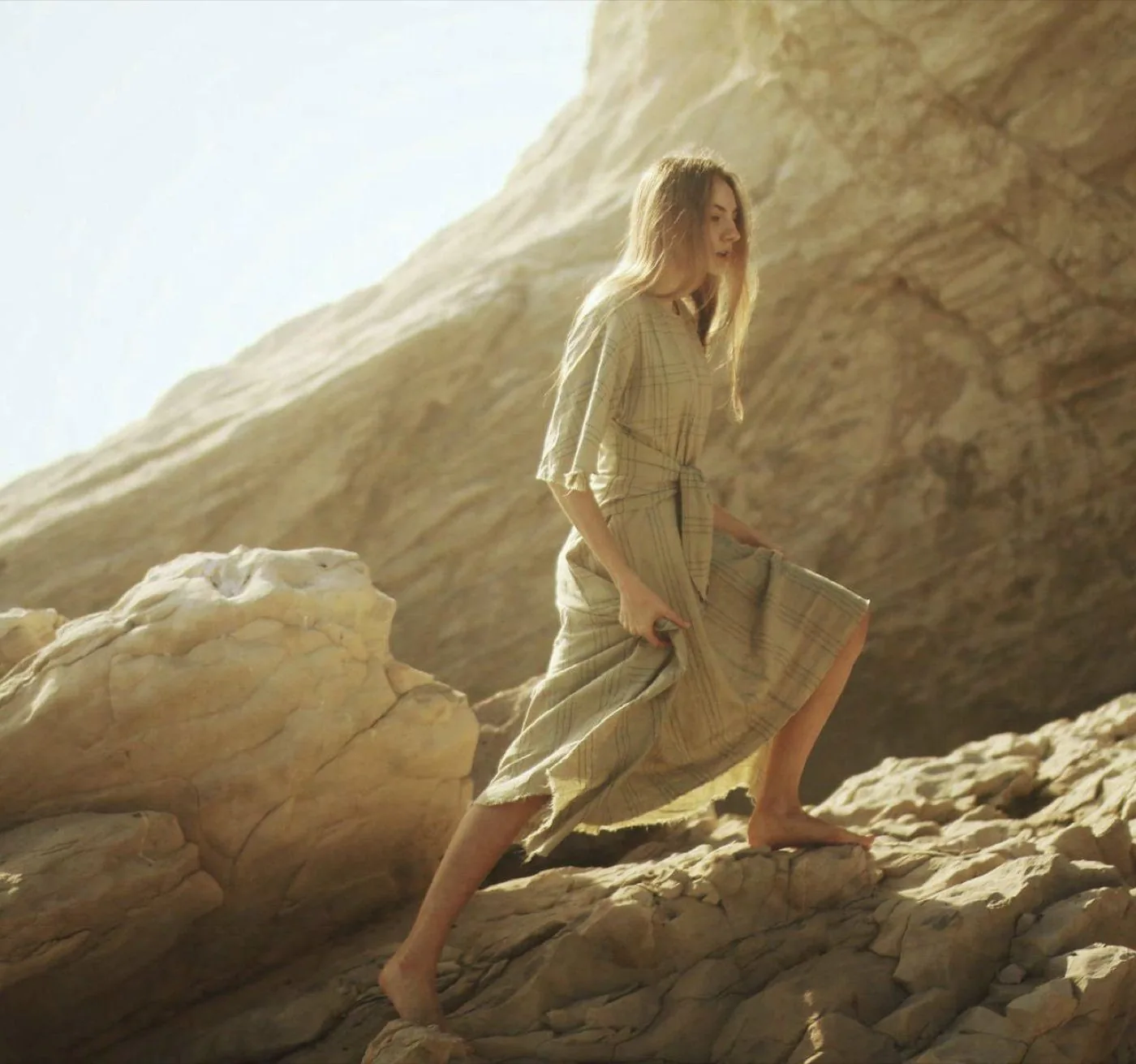 Earth, barefoot on warm stone